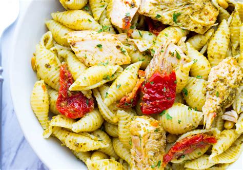 Easy Pesto Chicken Pasta With Sun Dried Tomatoes Recipe No Plate Like Home