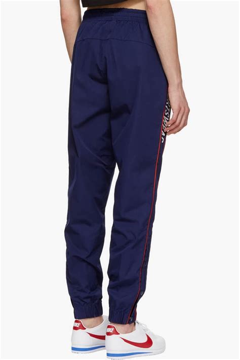 Buy Nikes Snap Button Track Pants In Black Hypebae