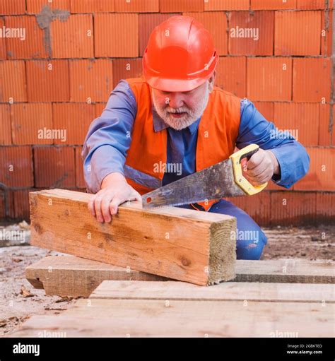 Worker Sawing Wood Hi Res Stock Photography And Images Alamy