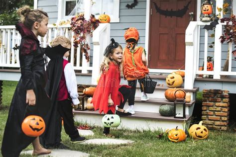 Little Kids Trick or Treating Stock Photo - Image of clothing, group: 126102258