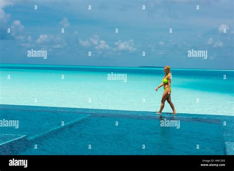 Woman Yellow Bikini Pool Hi Res Stock Photography And Images Alamy
