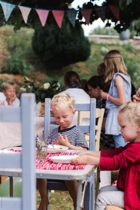 Little Boy Happy With His Food At Party By Stocksy Contributor Lea Jones Stocksy