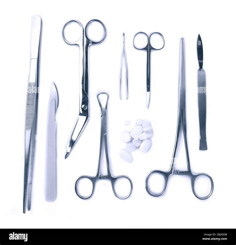 Surgery instruments isolated on white Stock Photo - Alamy