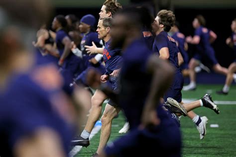 Photos: UVA Football Welcomes Special Guest to Early Morning Workout