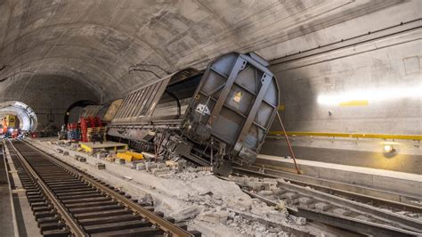 Key Swiss rail tunnel damaged by derailment won't fully reopen until ...