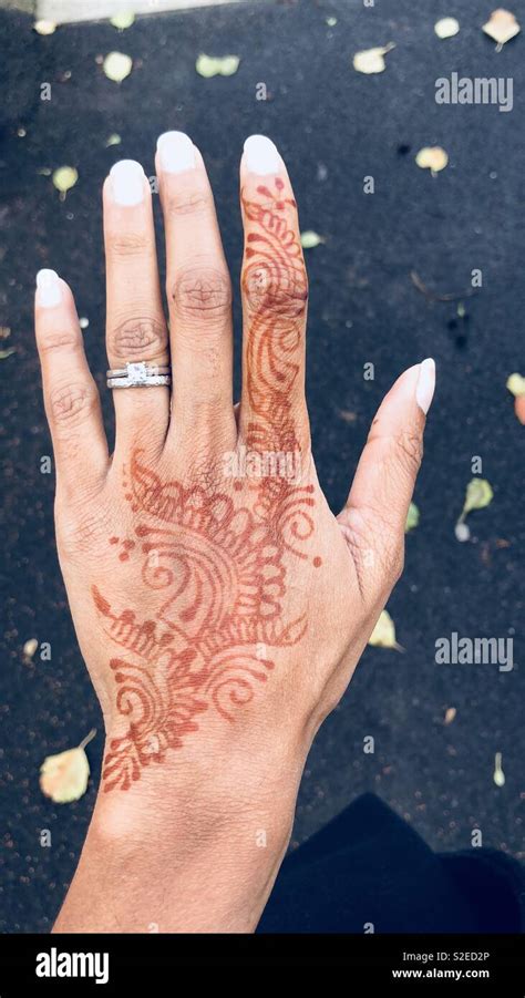 An Indian Female Hand With Mehndi Or Henna On Her Hand Stock Photo Alamy