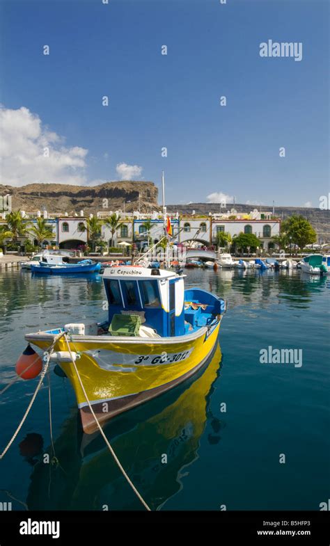 Gran Canaria Fishing Boat Moored In Puerto De Mogan Harbour With Marina