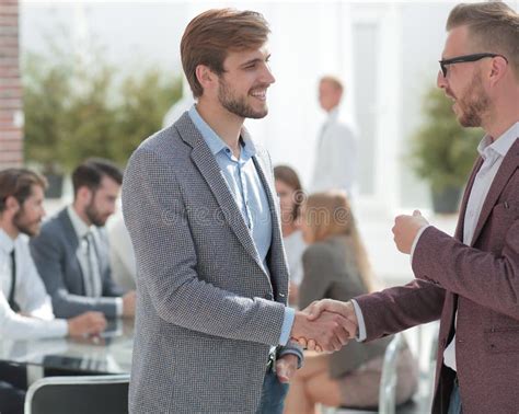 Two Business Men Talking Standing In The Office Stock Photo Image Of