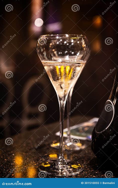 Visitors Drink Of Sparkling Wine Champagne On Outdoor Winter Festival In December On Avenue De