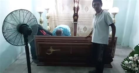 Dead Woman Knocks On Coffin During Her Own Wake