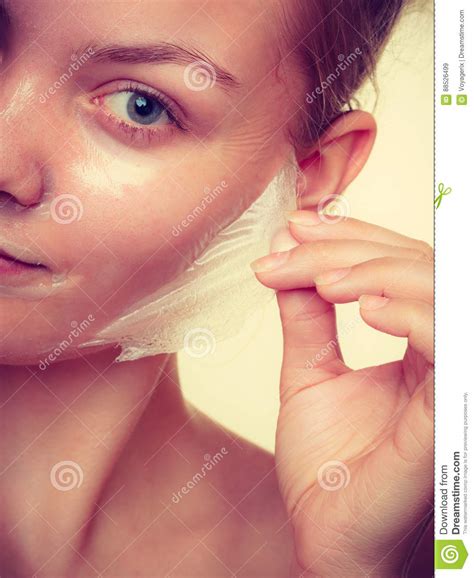 Woman Removing Facial Peel Off Mask Closeup Stock Image Image Of