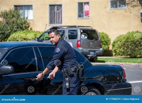 A Detective from LAPD`s Metro Division Enters His Car after Valley ...