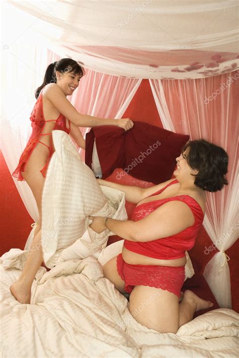 Women Pillow Fighting Stock Photo Iofoto 9614713