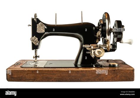 Vintage sewing machine white isolated Stock Photo - Alamy