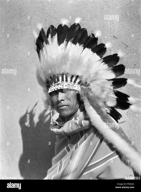 1930s Native American Man Wearing Full Feathered Headdress War Bonnet