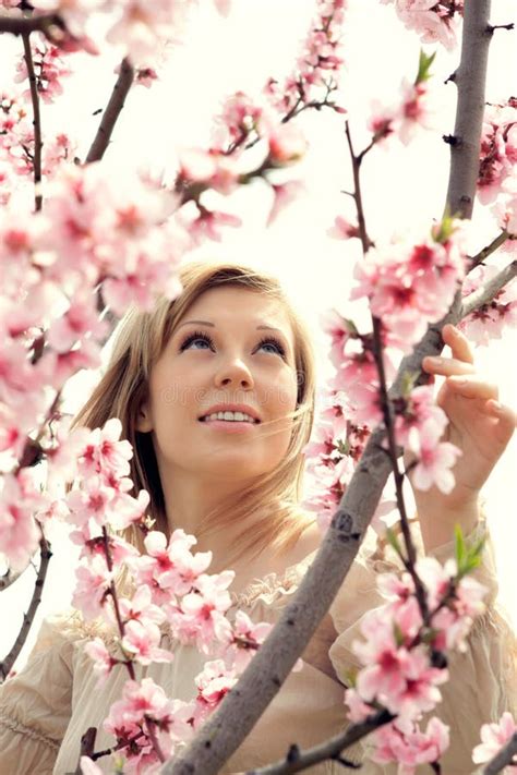 Portrait Of A Beautiful Woman With Pink Flowers Stock Photo Image Of