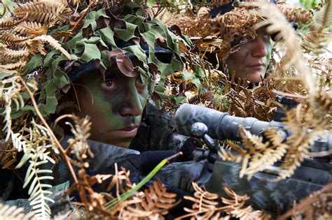 Honduran Commandos Demonstrate Their Sniper And Camouflage Skills For