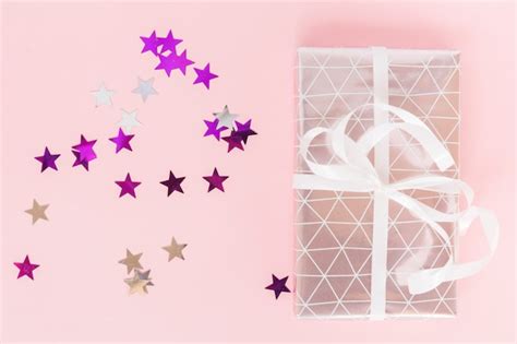 photo top view present  star confetti