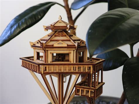 Miniature Treehouse Sculptures Built Around Houseplants By Jedediah