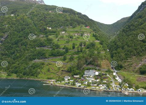 The Famous Eagle Road Down To Geiranger Fjord In Norway Stock Photo