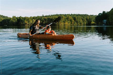 "Little Boy In A Kayak With His Grandmother On A Lake" by Stocksy ...