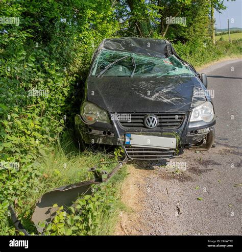 Badly Damaged Vw Golf After Crash On Roadside Stock Photo Alamy