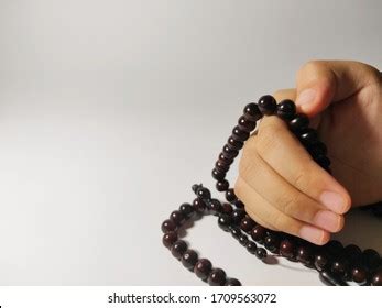 Image Hand Holding Prayer Beads Stock Photo 1709563072 Shutterstock