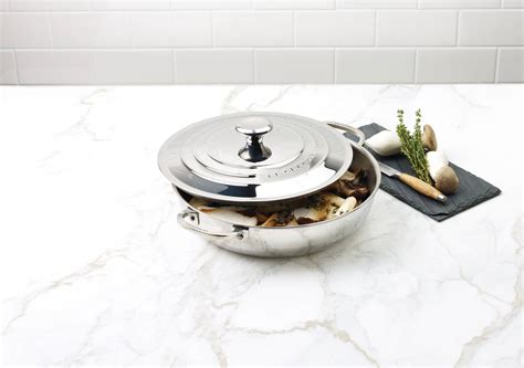 Le Creuset shines with a stainless steel collection - TASTET