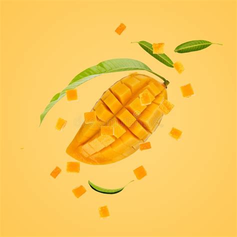 Ripe Mango Fruit Sliced With Cube And Green Leaves Stock Photo Image