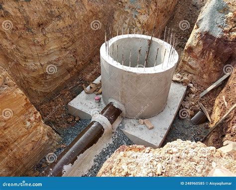 Sewerage Manhole And Pipes Line Under Construction At The Construction Site Editorial Image