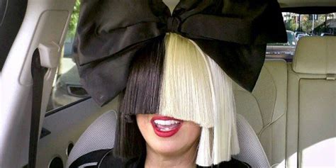 Sia Covering Face