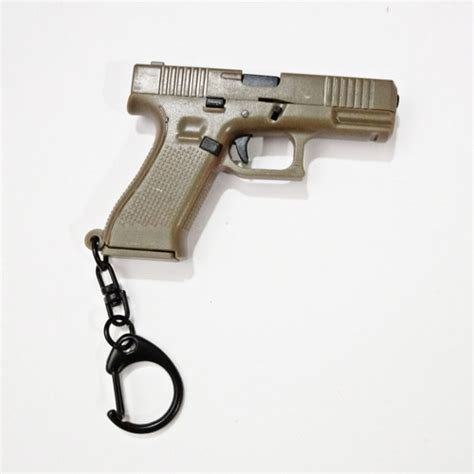 Chaveiro Pistola Glock G Militar T Tico Parcelamento Sem Juros