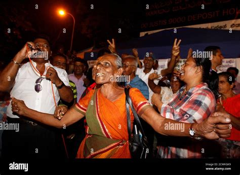 A Supporter Of Sri Lankas President Mahinda Rajapakse Celebrates After