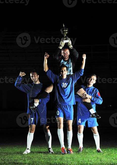 football players celebrating the victory 31052581 Stock Photo at Vecteezy