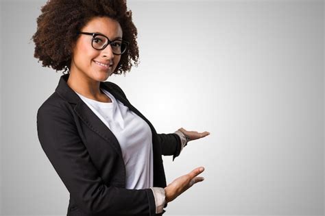 Premium Photo Business Black Woman Doing Welcome Gesture