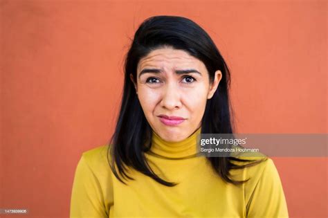 Latino Woman Making A Face Looking Uncertain Confused Perplexed Wtf