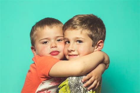 Portrait of Two Children Hugging Each Other Stock Photo - Image of male ...