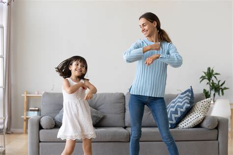 Bcbsks Blog Mother And Daughter Dancing Together In Living Room