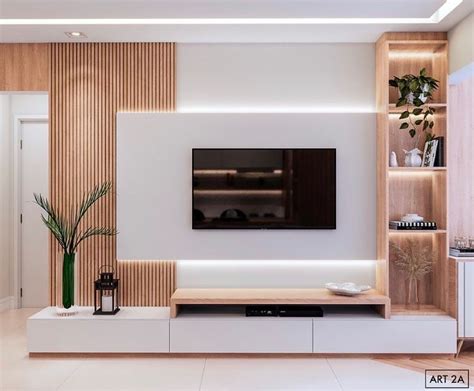 A Modern Living Room With White Walls And Wood Paneling On The Wall Tv