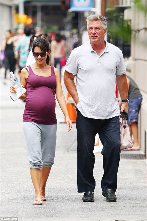 Alec Baldwin Carries Heavily Pregnant Wife Hilarias Handbag During New