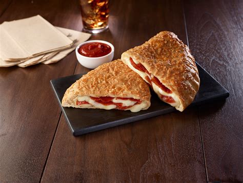 Pizza Hut's "P'Zone" Calzone Is Back For March Madness