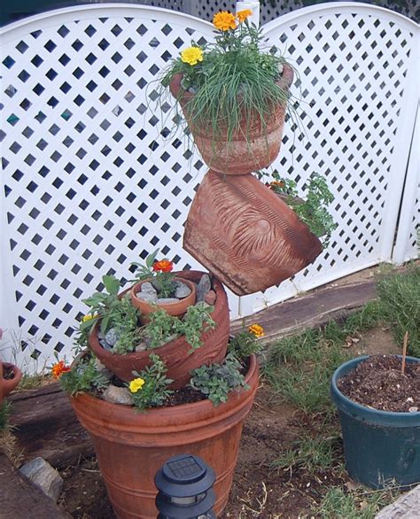 Marti Muses and Marvels: Clay Pot Tower Gardens