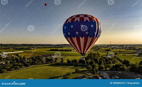 Aerial View On A Stars And Stripes Hot Air Balloon Floating Over A