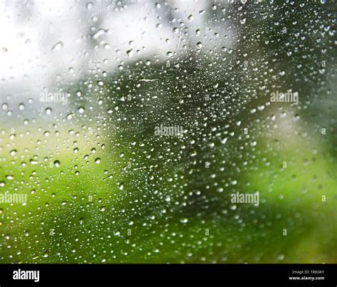 Rain Drops On Glass Rainy Day Window Glass With Water Drops And