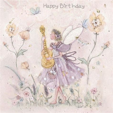 A Card With A Fairy Holding A Guitar