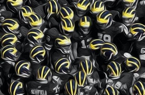 A Large Group Of Black And Yellow Helmets