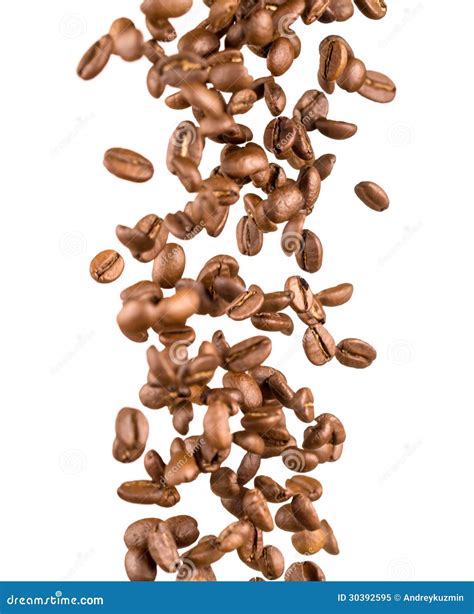 Falling Coffee Beans On The Dark Background Royalty Free Stock Image