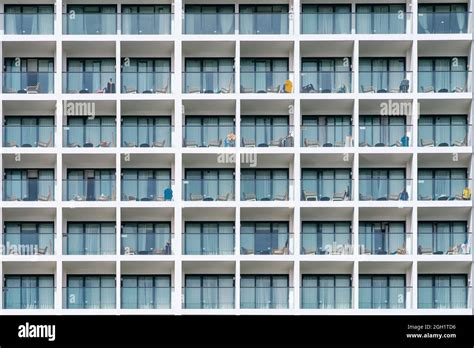 Building Facade With Balcony With Table And Chair Hotel Apartment