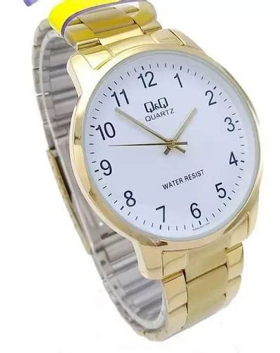 Reloj De Pulsera Q Q Anal Gico De Cuerpo Color Dorado Fondo Dorado