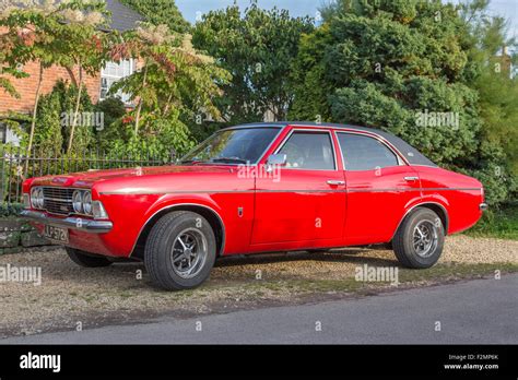 A red 1972 Ford Cortina Mk3 GXL four door Stock Photo - Alamy